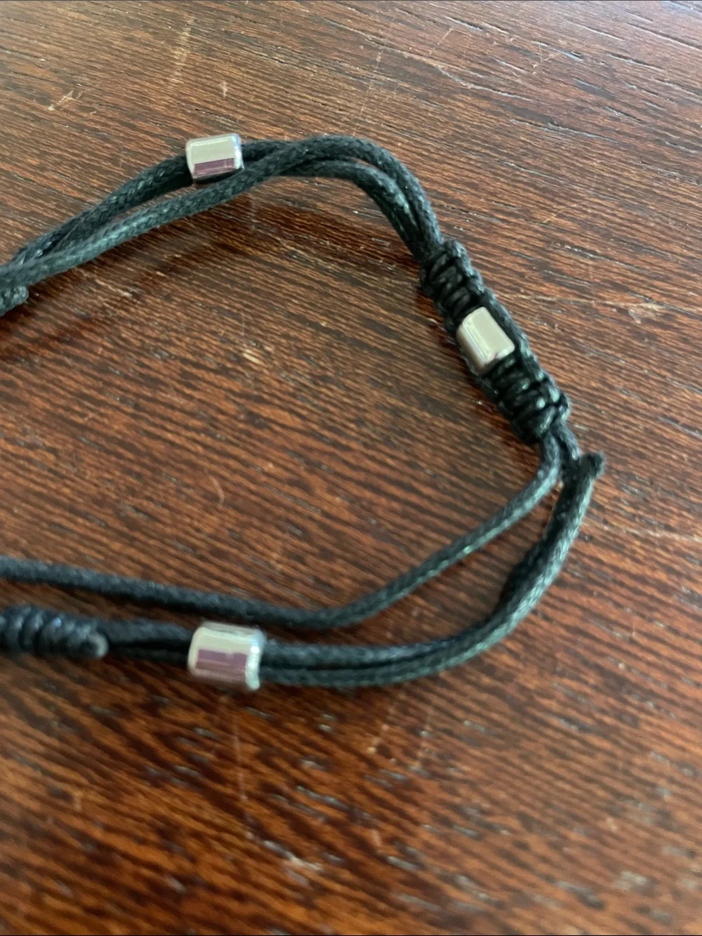 Men’s slider ID bracelets. Set of 2. Black. Braided. Stainless steel tags. NWOT